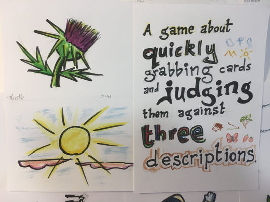 ... Quickly grabbing cards and judging them against three descriptions. (BAG)
